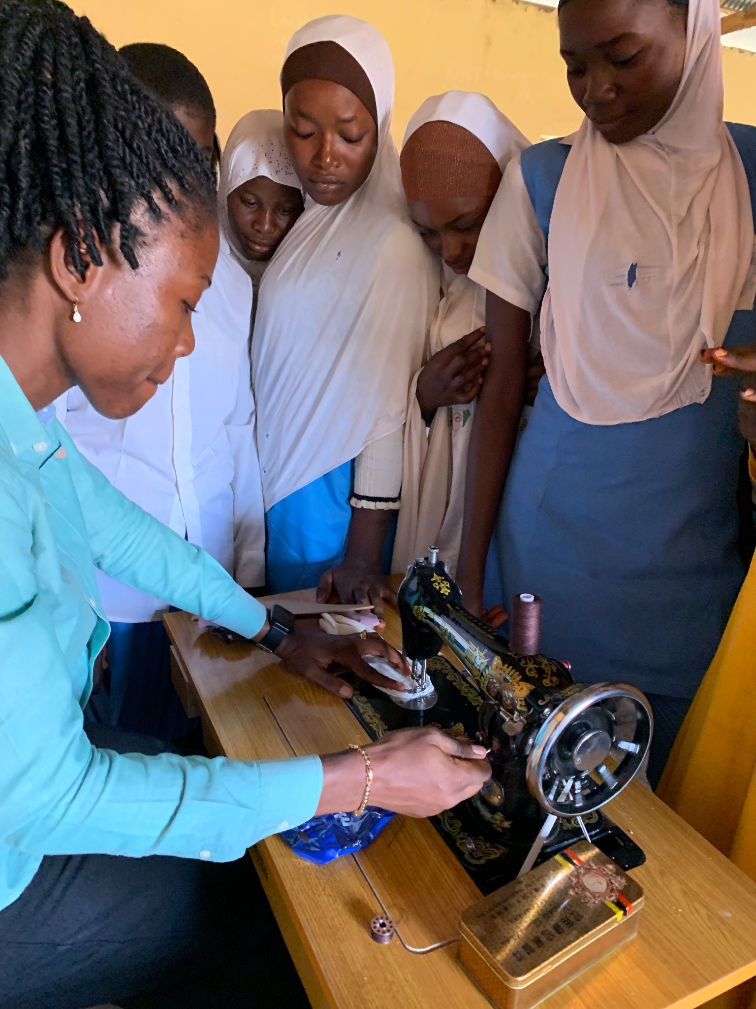 SuS Pads founder Bolu Olorunfemi trains girls to make their reusable pads